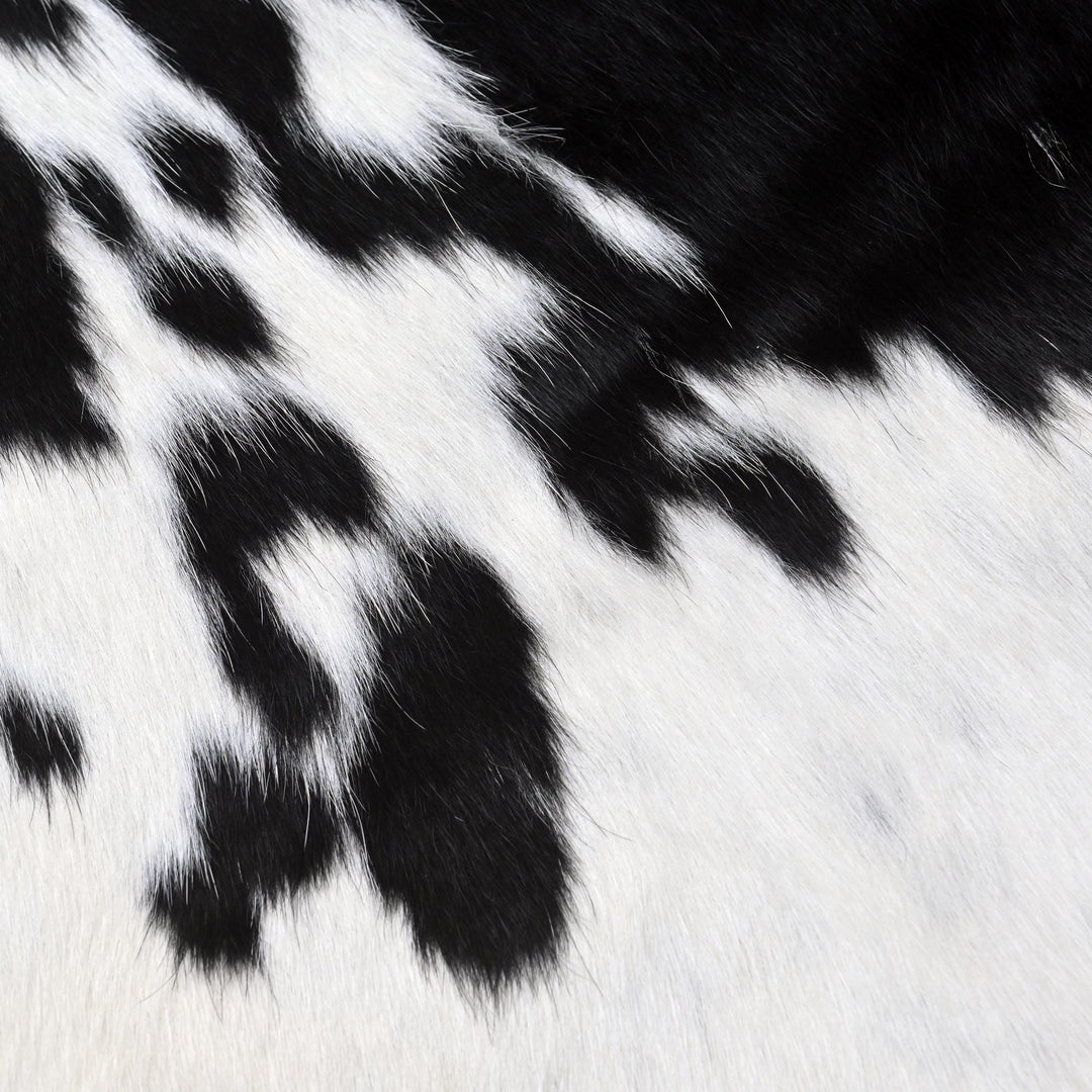 Spotted Spine Cow hide Rug 4X4.5 FT